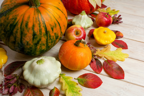 Fall small orange pumpkin, apples and squash decor