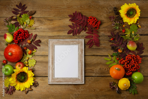 Wooden small frame mockup with sunflowers and rowanberry