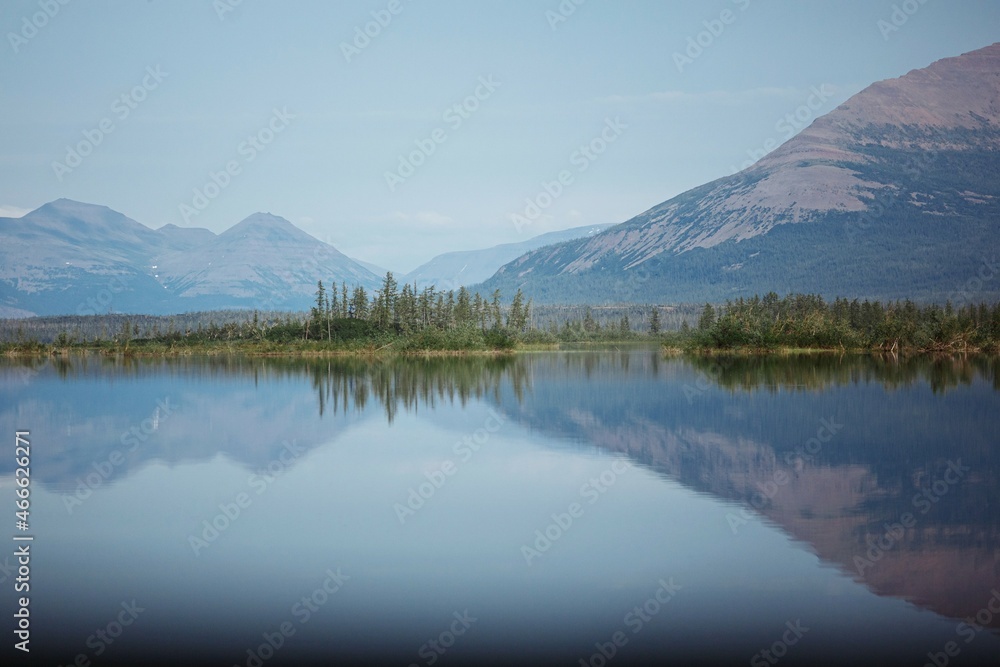 The landscape of the mountain lake with reflection