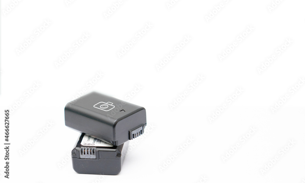 Rechargable camera battery on white background Rechargable camera battery on white background