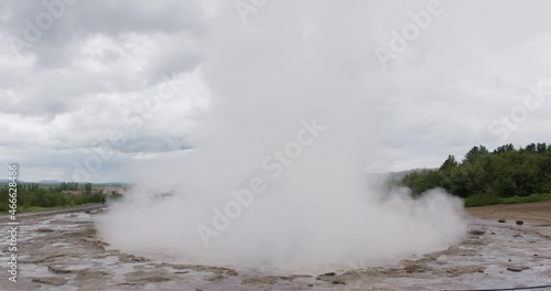 Geysir geyser tourism attraction close up in Iceland Golden circle photo