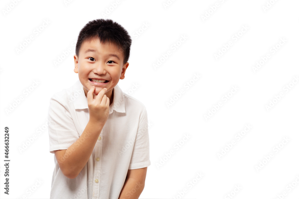 Excited kid with hand on chin isolated on white