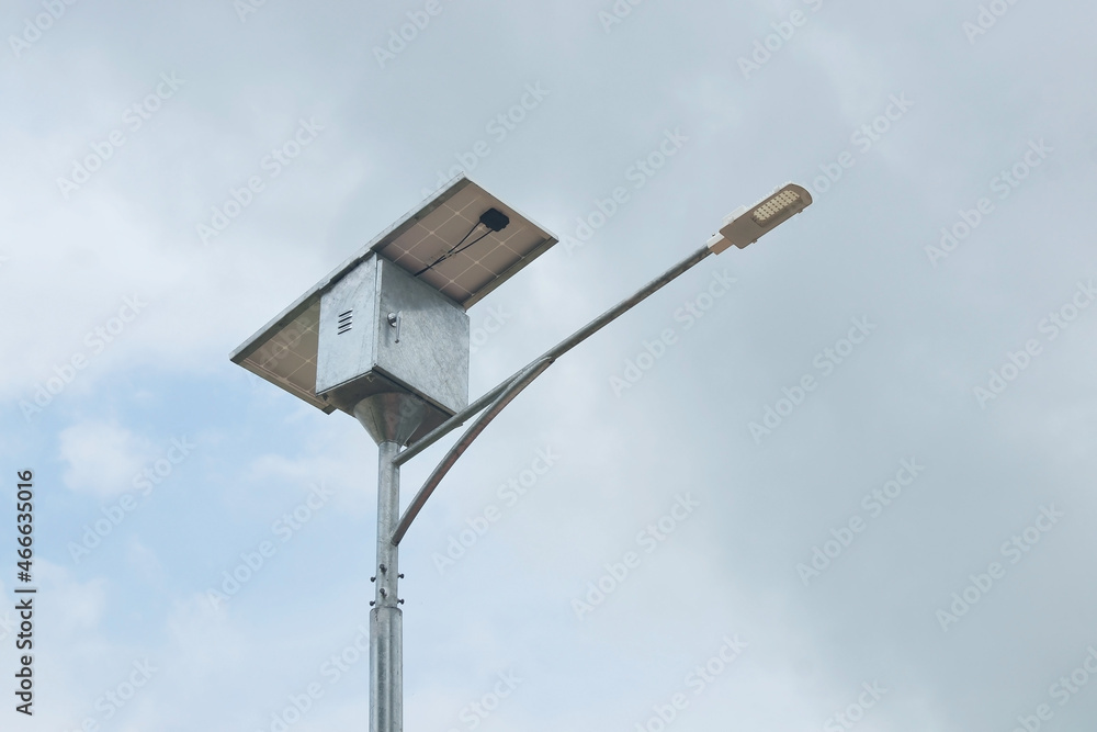 LED street light with solar cell panel on blue sky LED street light with solar cell panel on blue sky