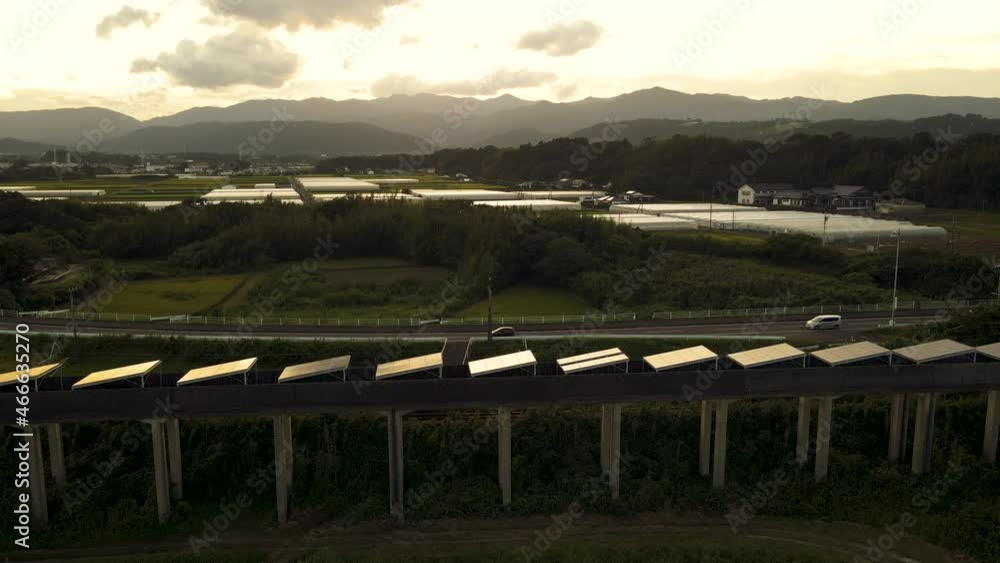 Solar Panels On An Abandoned Monorail Track In Kushu, Japan, Just After Sunset Solar Panels On An Abandoned Monorail Track In Kushu, Japan, Just After Sunset