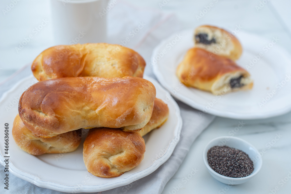 Traditional home made crescent rolls with poppy seeds Traditional home made crescent rolls with poppy seeds