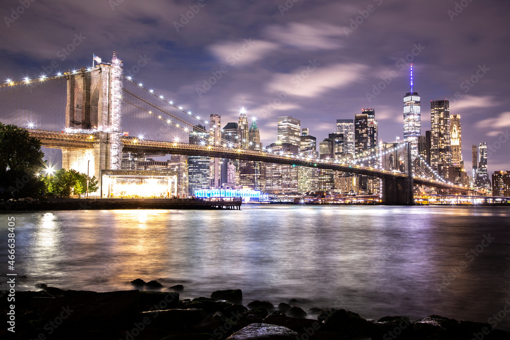 Night panorama with the downtown New York City skyline and the Brooklyn Bridge, viewed from Brooklyn Bridge Park