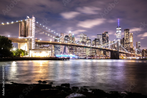 Night panorama with the downtown New York City skyline and the Brooklyn Bridge  viewed from Brooklyn Bridge Park