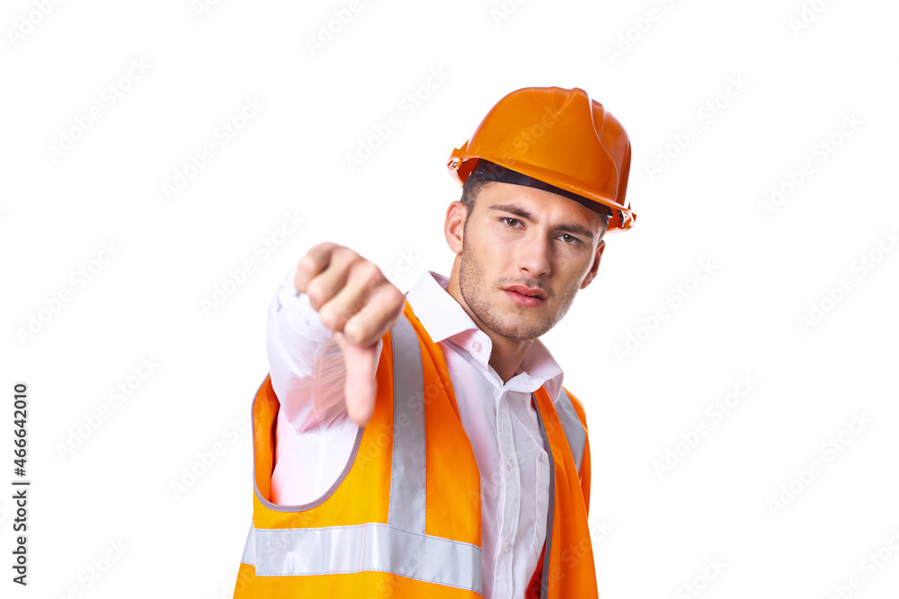 working man in orange uniform posing construction