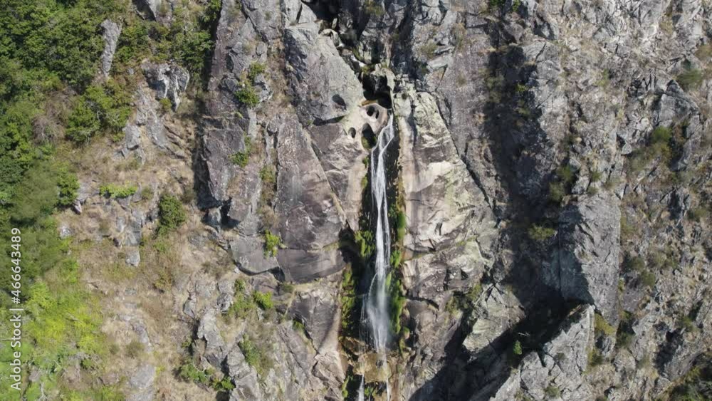 Aerial zoom in of natural waterfall named Aerial zoom in of natural waterfall named