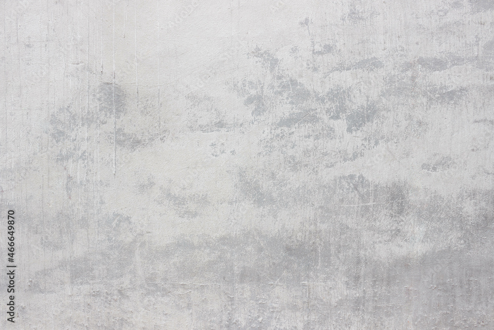 Fototapeta premium Old white wall with gray spots covered with cement. Ugly wall but beautiful texture. 