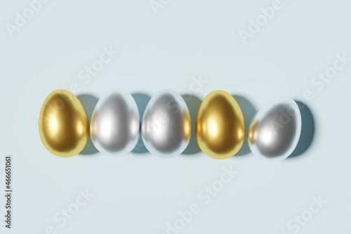3d render of silver and gold easter eggs on a sky blue background