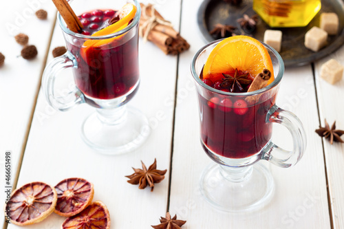 Mulled wine with cinnamon, cranberry and orange. Hot drink. Winter.