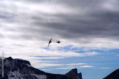 Swiss Air Force FA-18 Hornet fighter up in the air at Axalp air show on a grey and cloudy autumn day. Photo taken October 19th, 2021, Brienz, Switzerland.