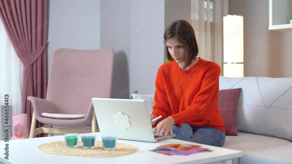 Woman working thoughtfully on laptop..
Work from home lifestyle. Woman working thoughtfully on laptop..
Work from home lifestyle.