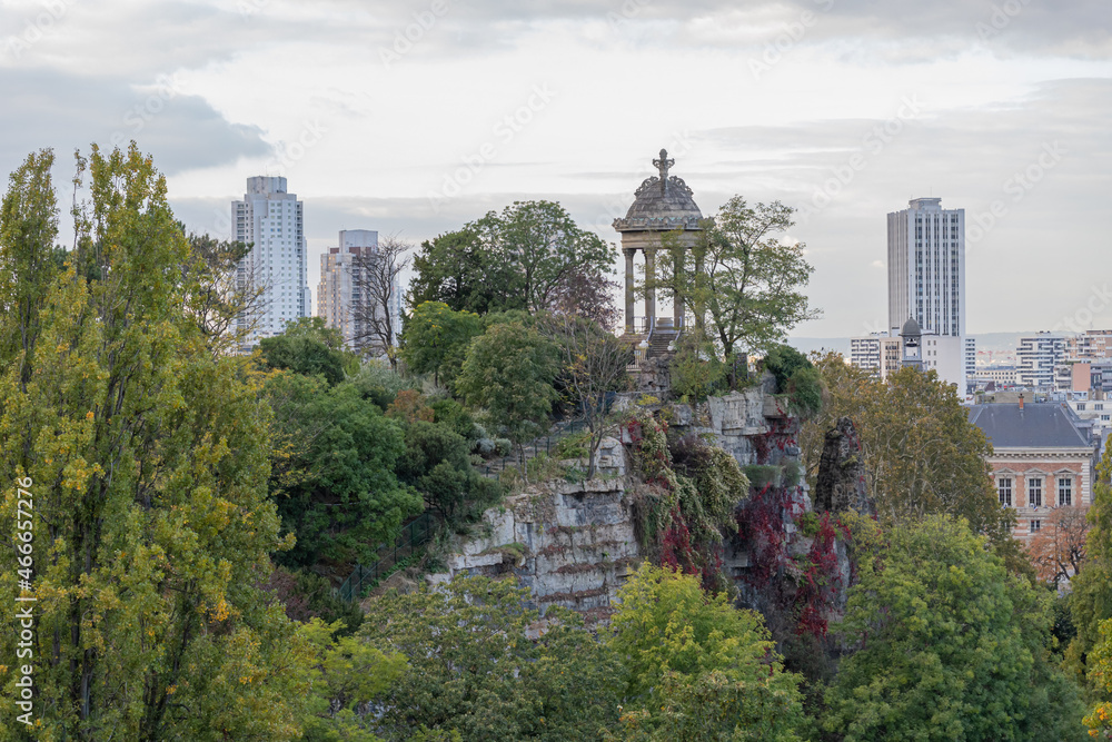 Fototapeta premium Paris, France - 10 23 2021: Park des Buttes Chaumont. View of the Temple of the Sibyl in the belvedere Island