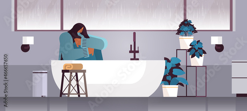 unhappy depressed woman sitting in shower girl feeling desperate and lonely mental health diseases depression stress