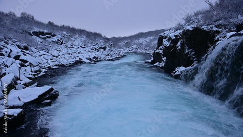 Beautiful clear water stream of Bruar river in Iceland during winter season photo