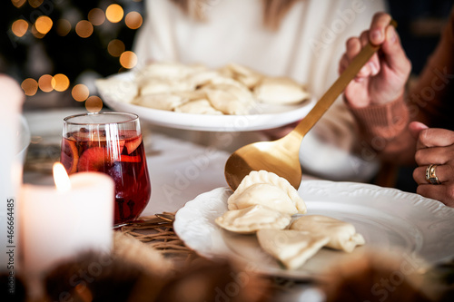 Eating dumplings at the Christmas Eve photo