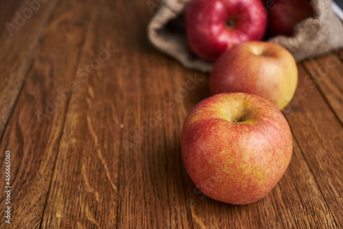 apples on a wooden table vitamins fresh fruits organic