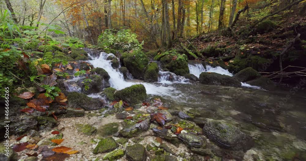 Mountain stream with small and waterfalls in autumn, Zumberak, Croatia Mountain stream with small and waterfalls in autumn, Zumberak, Croatia