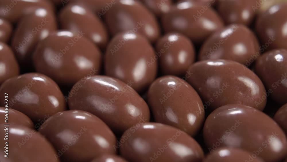 Chocolate candy balls close up. Macro. Dolly shot Chocolate candy balls close up. Macro. Dolly shot