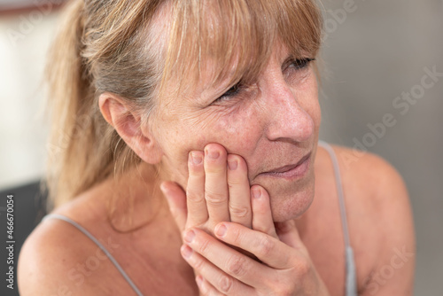 Mature woman suffering from toothache