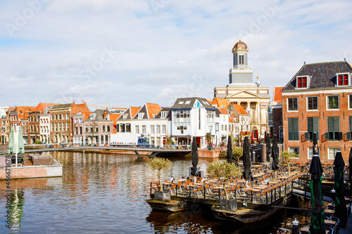 Cityscape of Leiden  the Netherlands. View of New Rhine river and Dutch houses.