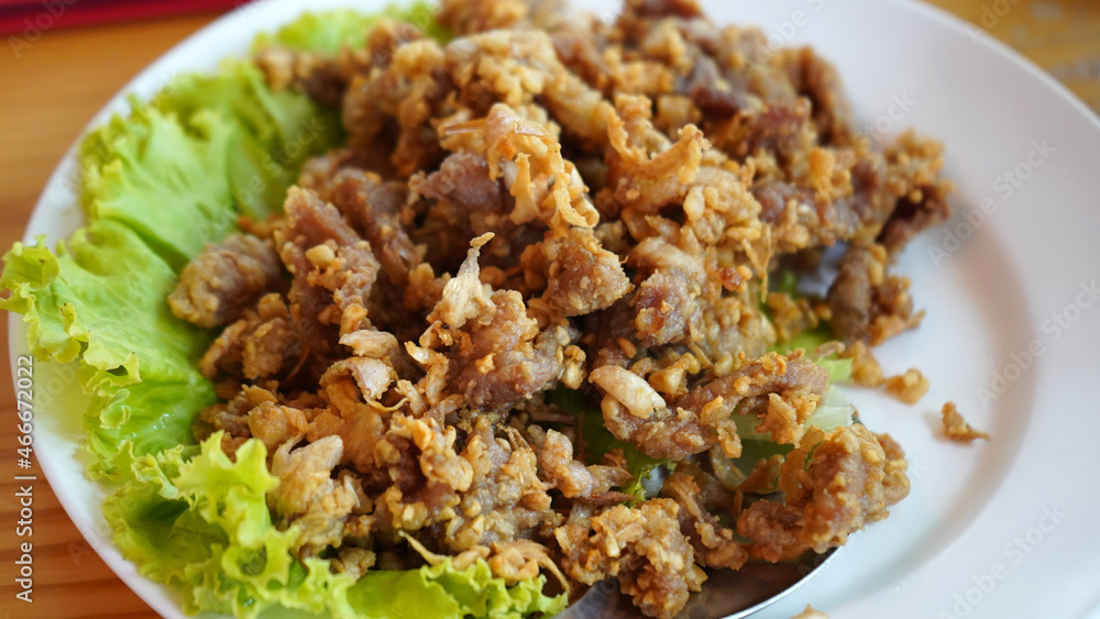 The favourite Thai food, deep fried garlic pork. The favourite Thai food, deep fried garlic pork.