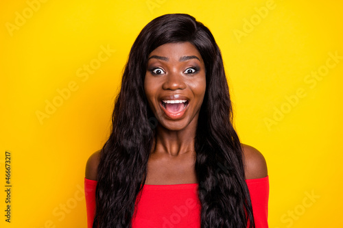 Photo of shiny impressed dark skin lady wear off-shoulders top open mouth isolated yellow color background