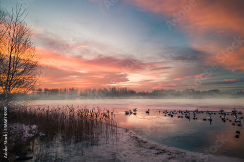 Frozen Lake by Wintry Sunrise