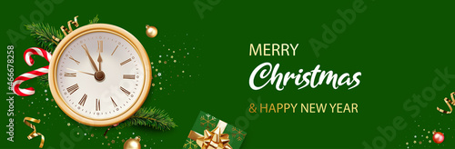 Merry Christmas and New Year banner. Green Xmas background with golden clock, glitter golden confetti, branches of Christmas tree, golden ball and red Xmas candy canes. Realistic vector illustration.
