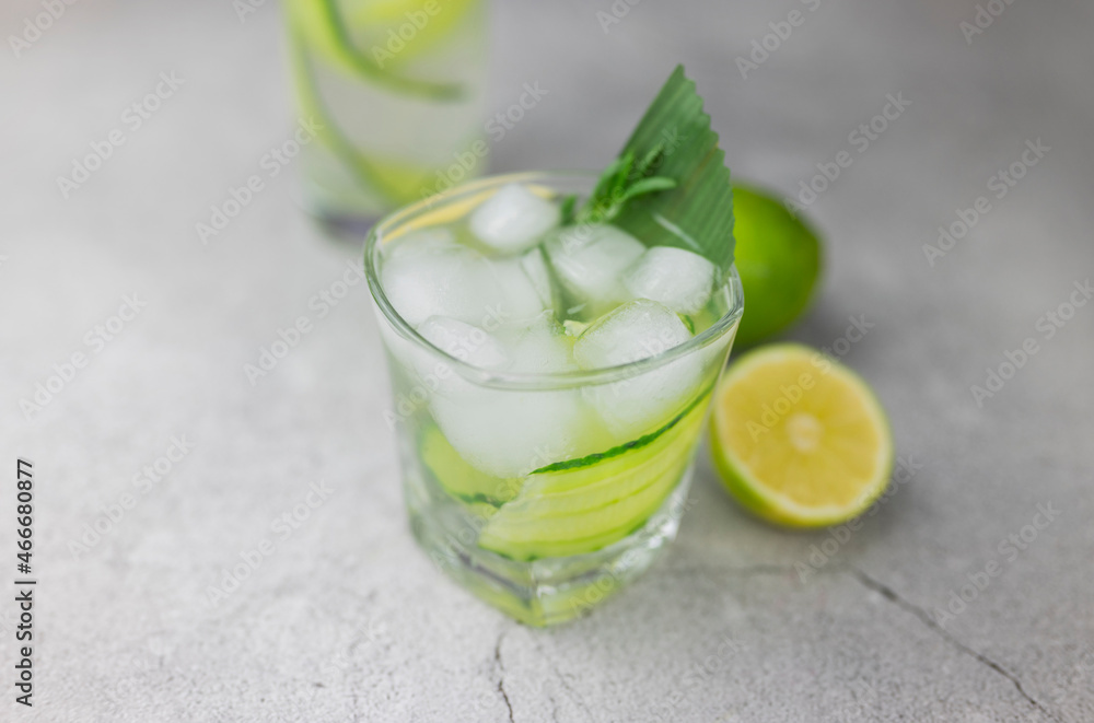 cocktail drink alcoholic with green cucumber and tonic with lime cocktail drink alcoholic with green cucumber and tonic with lime