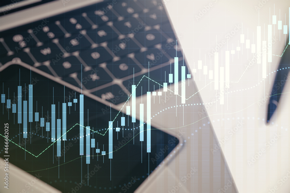 Abstract creative financial graph on modern laptop background, financial and trading concept. Multiexposure Abstract creative financial graph on modern laptop background, financial and trading concept. Multiexposure