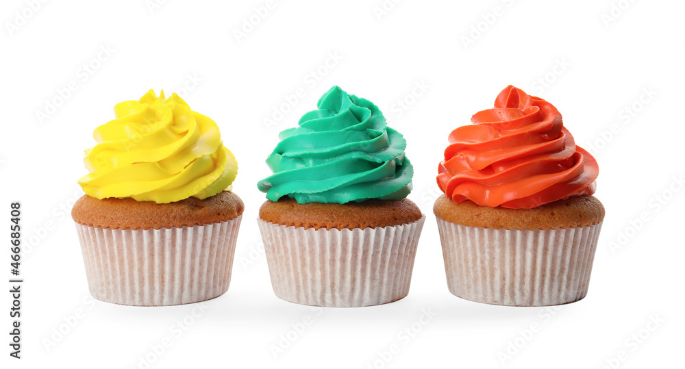 Different delicious colorful cupcakes on white background Different delicious colorful cupcakes on white background