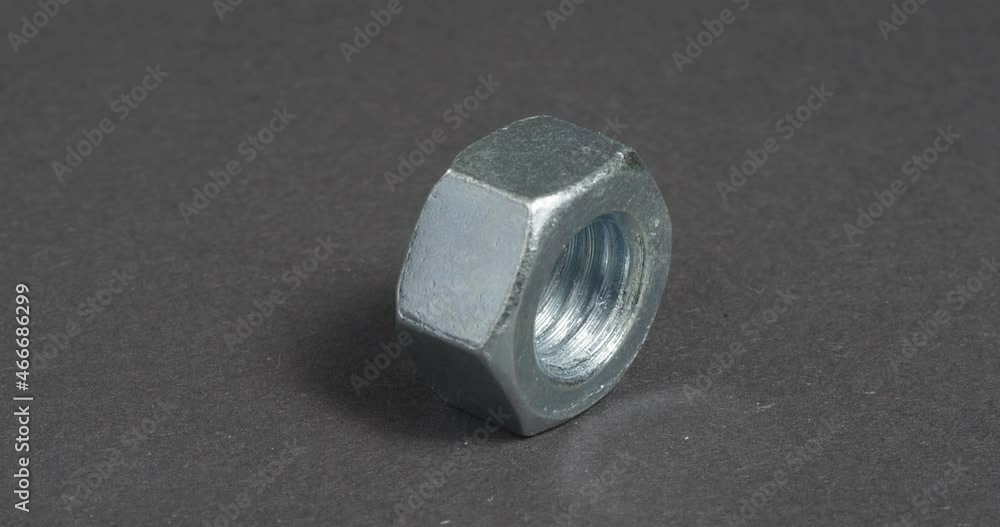 Screw close-up on a dark background. Fastener. Screw close-up on a dark background. Fastener.