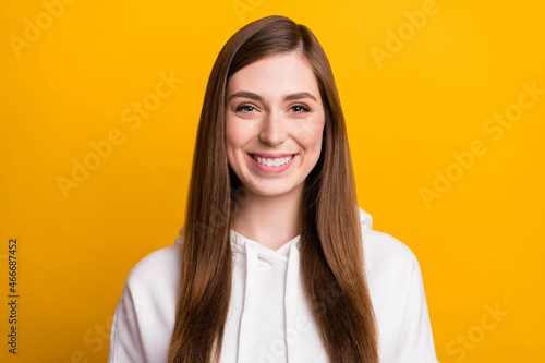 Photo of cheerful young nice happy positive woman smile good mood isolated on shine yellow color background © deagreez