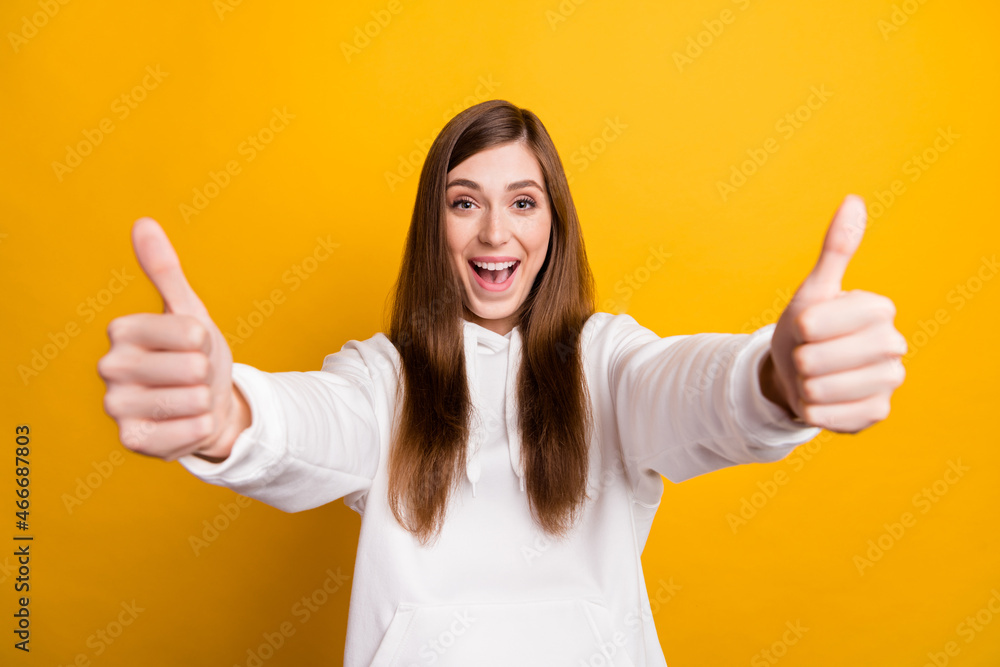 Photo of young cheerful positive happy woman make thumb up good mood sale isolated on yellow color background