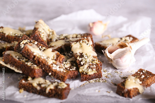 black bread croutons with cheese and garlic