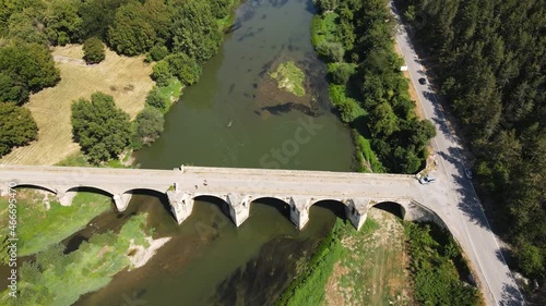 Aerial view of Nineteenth-century bridge over the Yantra River, known as the Kolyu Ficheto Bridge in Byala, Ruse region, Bulgaria photo