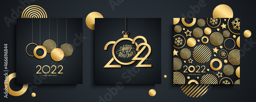 2022 Happy New Year luxury greeting cards set. New Year holiday invitations templates collection with hand drawn lettering and gold christmas balls. Vector illustration.