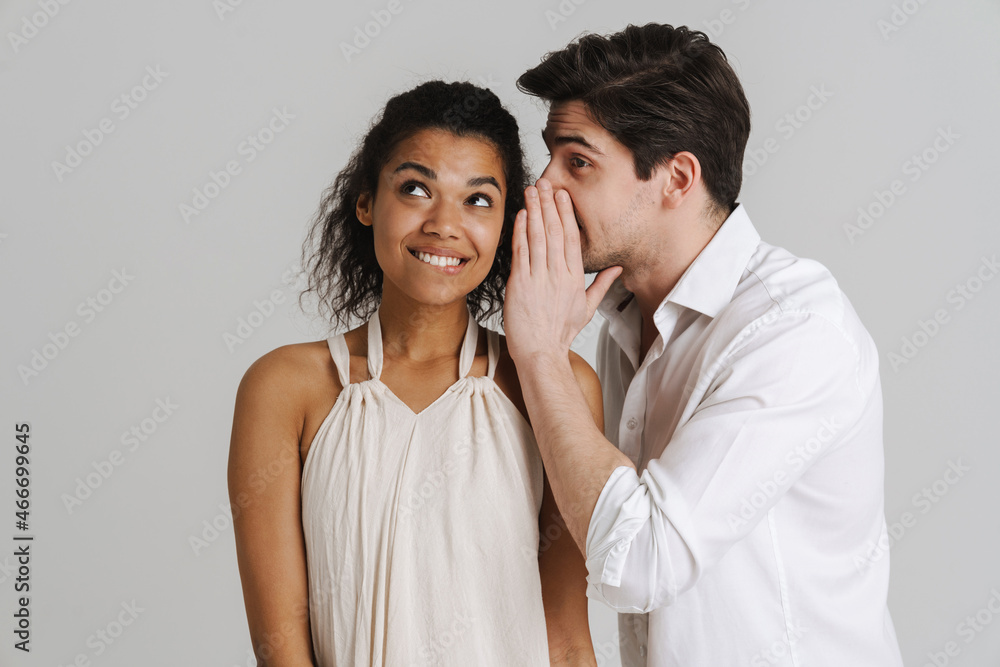 Happy young multiethnic couple in casual wear Happy young multiethnic couple in casual wear