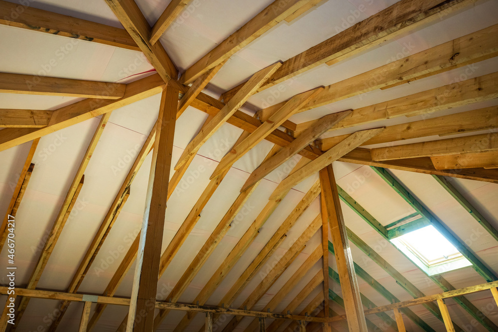 Fototapeta premium wooden roof frame truss system. attic construction