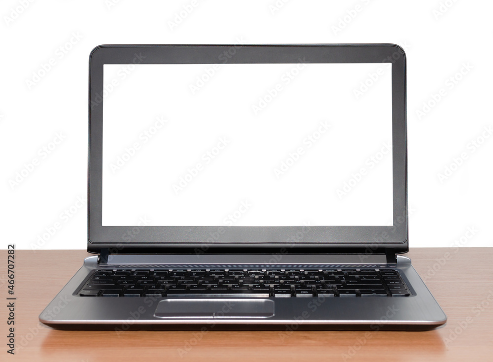 laptop on a wooden table laptop on a wooden table