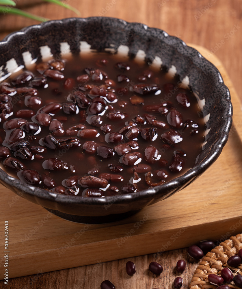 Adzuki red bean soup on wooden table background. Adzuki red bean soup on wooden table background.
