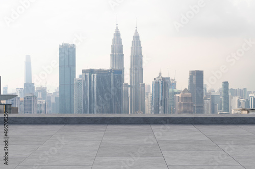 Panoramic Kuala Lumpur skyline view, concrete observatory deck on rooftop, daytime. Asian corporate and residential lifestyle. Financial city downtown, real estate. Product display mockup empty roof