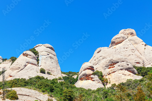 Large peaked cliffs of Montserrat mountains in Catalonia, Spain . Landscape of Montserrat natural massif . Mountain for alpinism