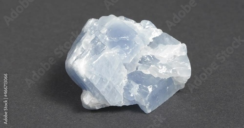 Calcite blue close-up on dark background. Rotation.