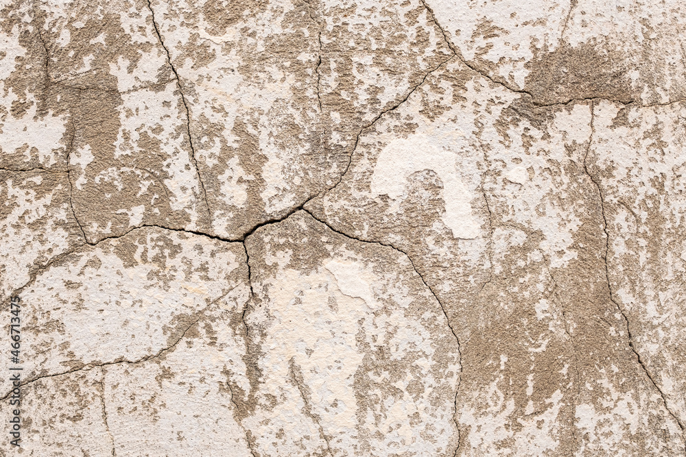 Fototapeta premium Cracked concrete texture. Close-up background.