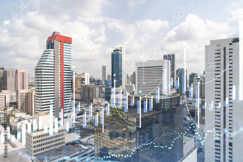 Forex and stock market chart hologram over panorama city view of Bangkok  the financial center in Southeast Asia. The concept of international trading. Double exposure.