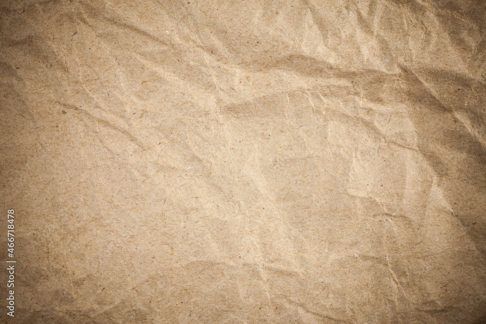 Textured crumpled packaging brown paper background. Textured crumpled packaging brown paper background.
